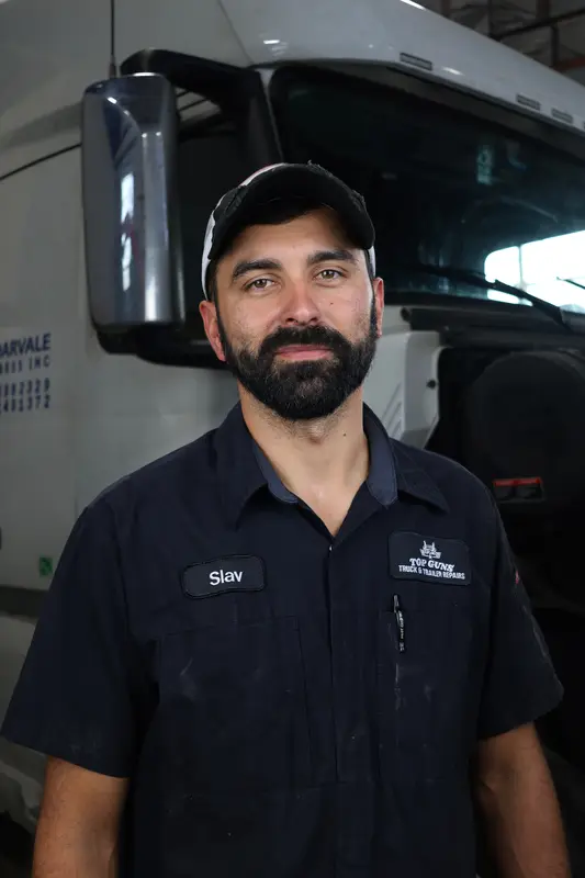 Slav, owner of Top Guns Truck & Trailer Repairs, in the shop.